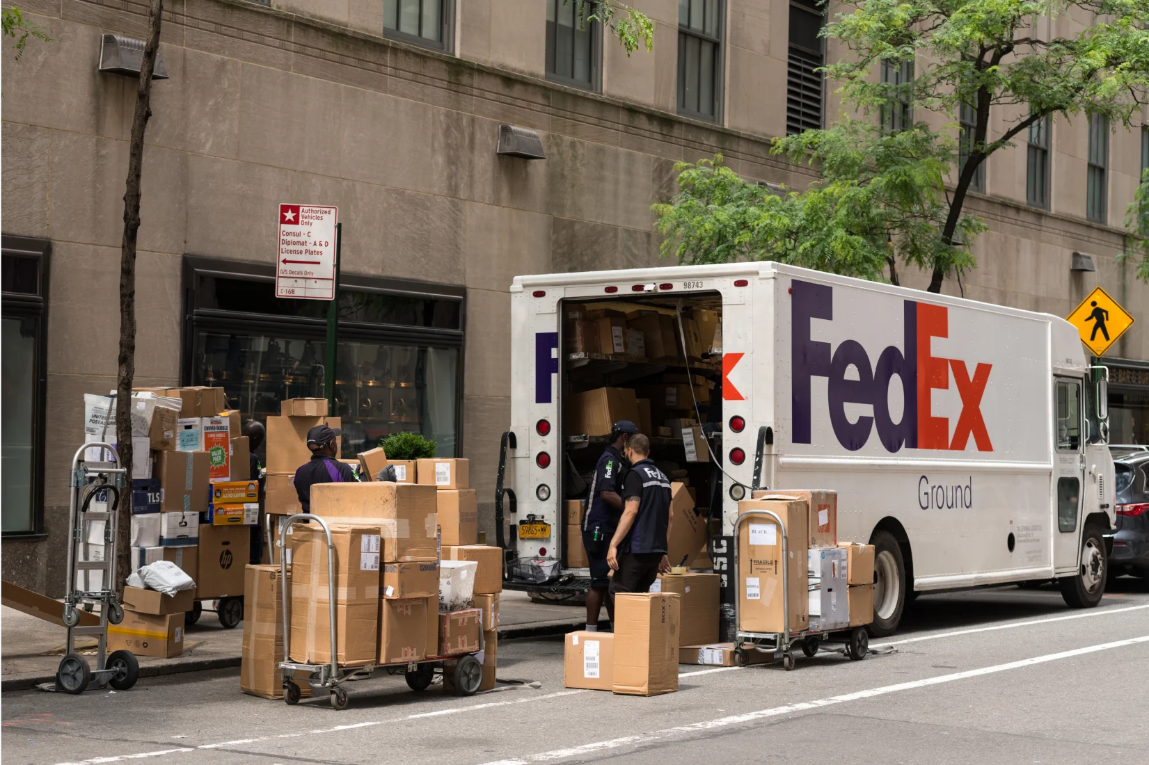 FedEx delivery van with packages for courier service