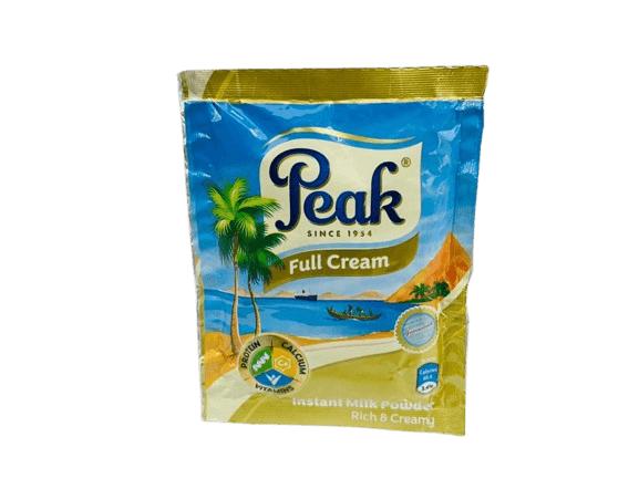 Nigerian shopper checking Peak Milk product label before buying